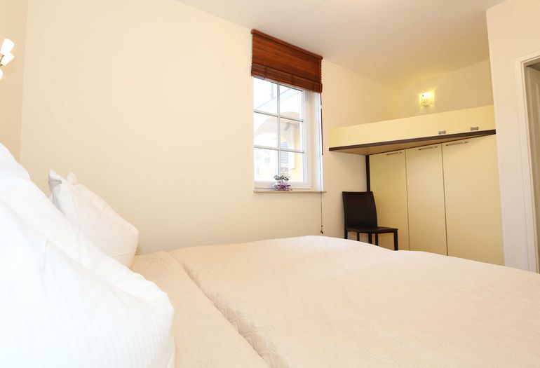 Schlafzimmer mit Doppelbett Schlafzimmer mit Doppelbett