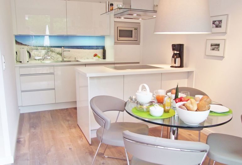 Haus Meeresblick A 4.03 Urlaubsglück -gedeckter Tisch