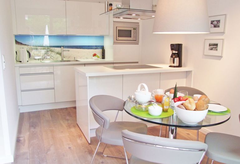 Haus Meeresblick A 4.03 Urlaubsglück -gedeckter Tisch Haus Meeresblick A 4.03 Urlaubsglück -gedeckter Tisch
