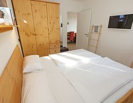 Villa Düne Whg. 14 mit Balkon/Meerblick & Sauna