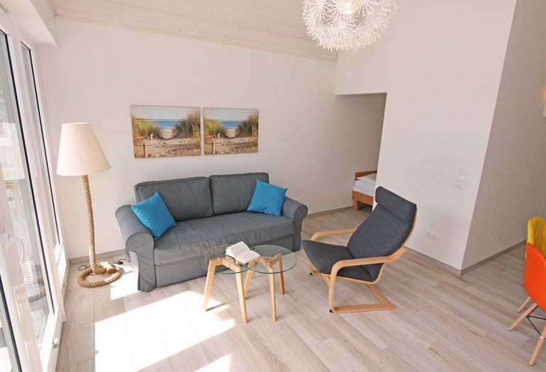 Wohnzimmer grenzt an das Schlafzimmer an Wohnzimmer grenzt an das Schlafzimmer an
