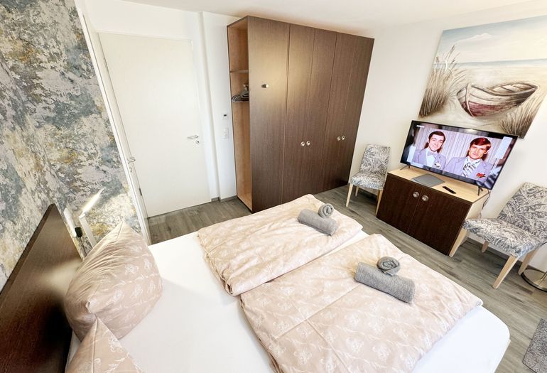 Wohnbereich mit TV Wohnbereich mit TV