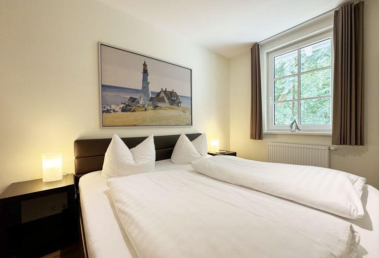 Schlafzimmer mit Doppelbett
