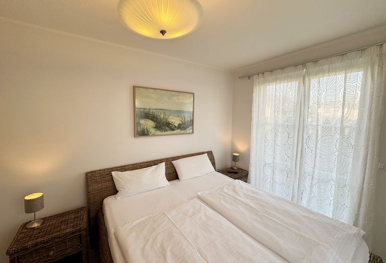 Schlafzimmer mit Doppelbett