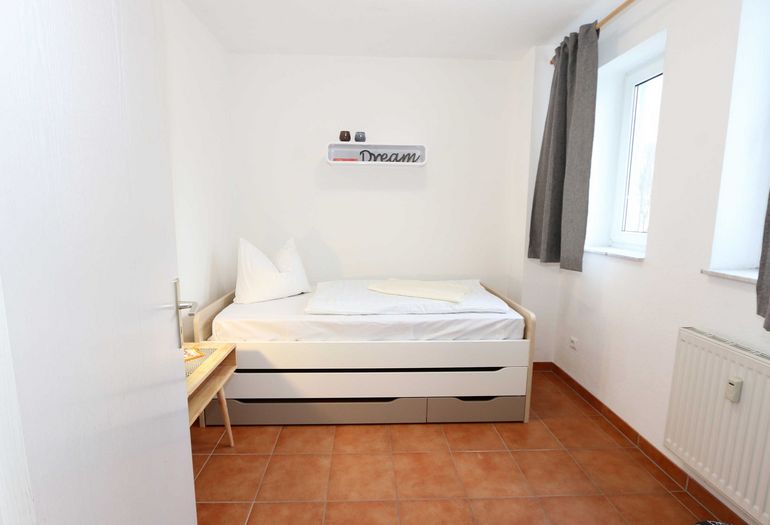 1. Schlafzimmer mit Einzelbett 1. Schlafzimmer mit Einzelbett