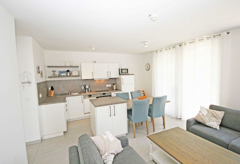 Wohnbereich mit Blick in die Küche Wohnbereich mit Blick in die Küche