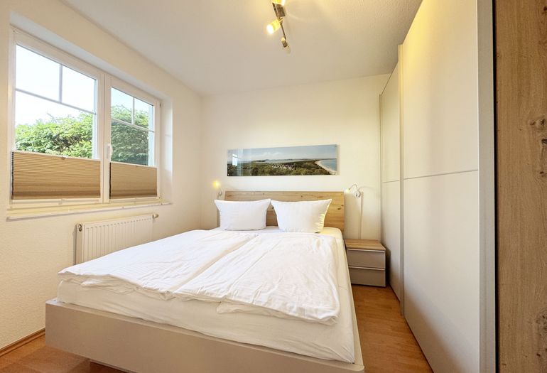 Schlafzimmer mit Doppelbett
