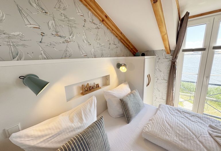 1. Schlafzimmer mit Seeblick 1. Schlafzimmer mit Seeblick