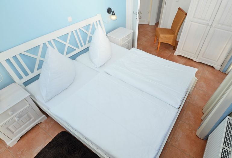 Schlafzimmer mit Doppelbett