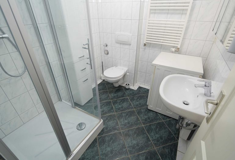 Ferienwohnung Strandstrasse 8/4 mit Balkon Ferienwohnung Strandstrasse 8/4 mit Balkon