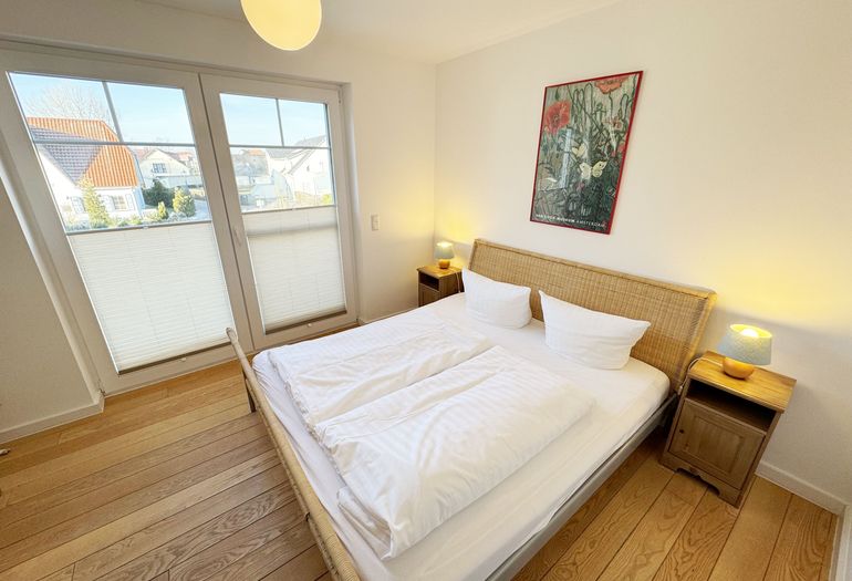 Schlafzimmer mit Doppelbett
